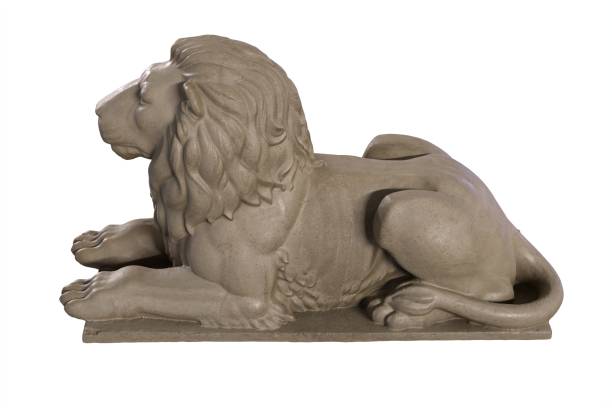istock 3D render of lying lion stone sculpture isolated on white 1288218715
