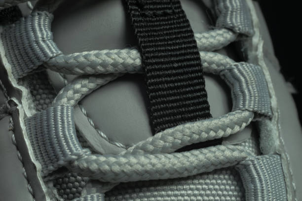 istock Close up beautiful shoeloces shoes background pattern texture. Macro photography view. 1288218770