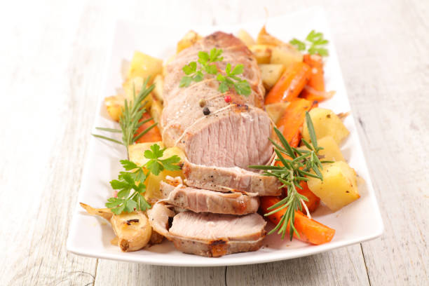 istock roasted meat slices and vegetables 1288218878