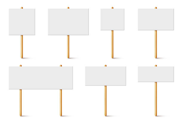 istock Blank protest sign with wooden holder. Realistic vector demonstration banner. Strike action cardboard placard mockup 1288220857