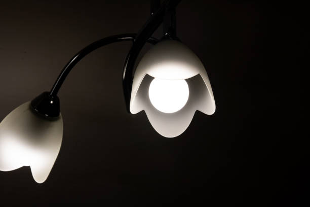 istock Chandelier with a lamp in the dark 1288222464