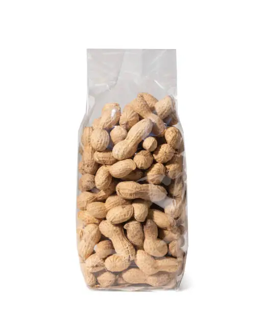 Peanuts in Plastic Package, with Shell - Close-Up - Isolated on White Background