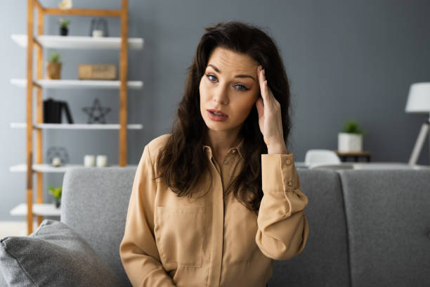 istock Casual Woman With Headache 1288224203