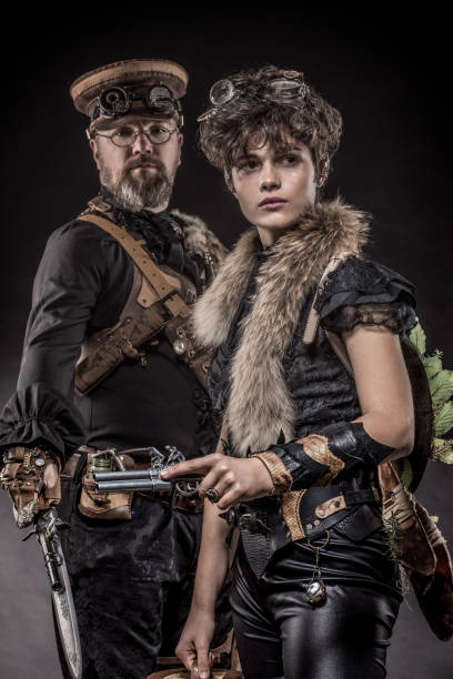 istock Steampunk couple in a studio shot 1288225394