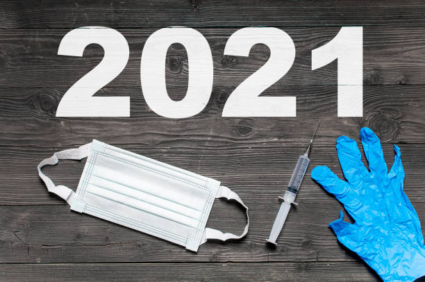 istock 2021 designed from the mask, glove and syringe 1288225424