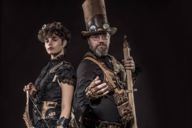 istock Steampunk couple in a studio shot 1288226497