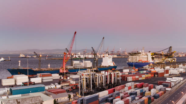istock Cape Town Docks and ships at dusk looking towards the harbour and cargo loading docks 1288226681