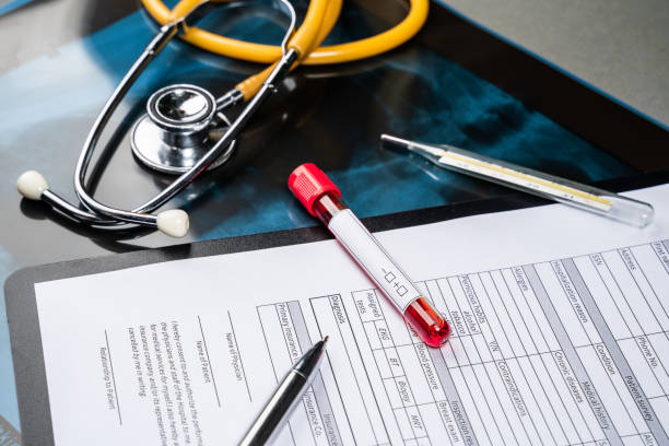 istock Blood vial with blood sample on test form 1288227366