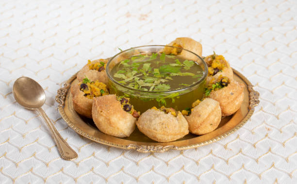 Gol Gappa or Pani Puri The Traditional Indian Spicy Street Food Gol Gappa or Pani Puri panipuri stock pictures, royalty-free photos & images