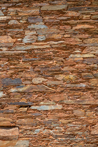 istock Architecture textures, detailed rusty and rustic old wall masonry schist 1288231429
