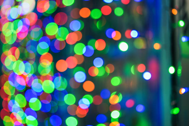 istock Christmas background. Green, red and blue lights. Bright blurred bokeh 1288242027