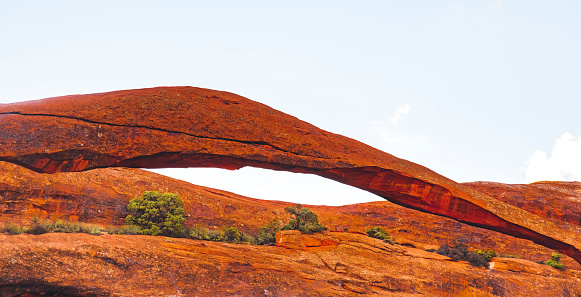 The Landscape Arch in the Arches National Park in Utah, United States, looks like a thin bridge and is the longest natural arch in the park which have thousands of natural red rock arches, pinnacles and giant balanced rocks.