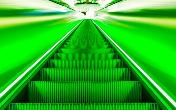 istock Blurred motion of moving walkway. Abstract View of Moving Walkway 1288247498