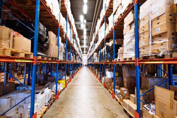 istock Warehouse isles and racks - vacancy in logistics centre 1288248668