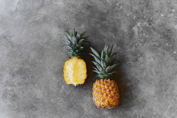 istock Pineapple on a stone table. Tropical Fruits. 1288248939