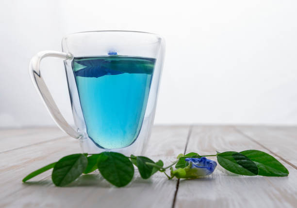 istock pea blue flower tea in a transparent cup 1288252187