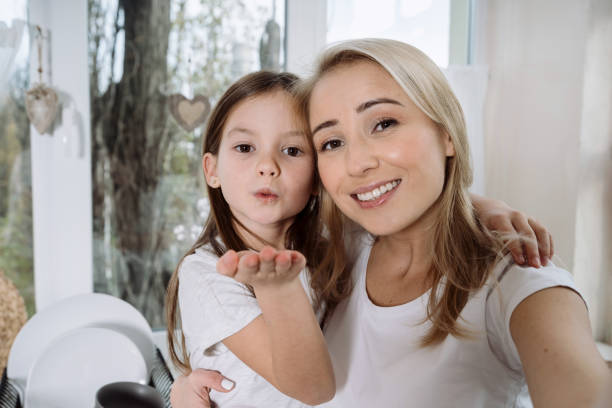 istock Mother and daughter spending time at home 1288253495