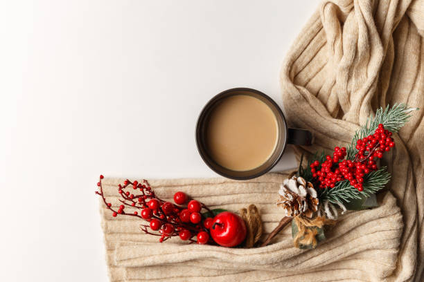 istock Abstract autumn composition. Colorful background image. Autumn, winter concept. Top view. Flat lay. Copy space. Plaid, dried leaves, cup of coffee on white background. Thanksgiving day concept 1288254463