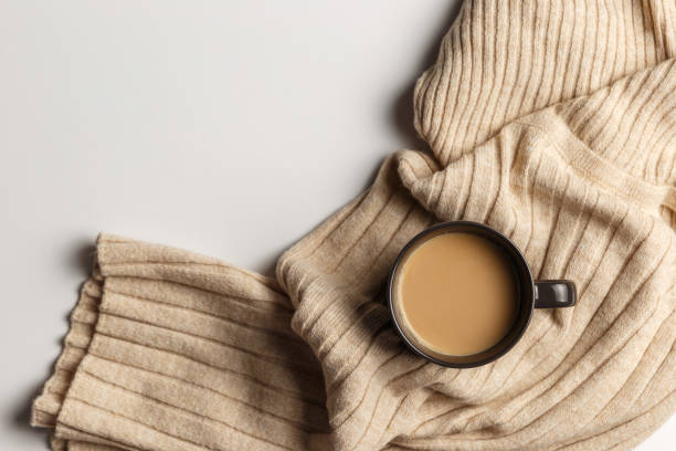 istock Abstract autumn composition. Colorful background image. Autumn, winter concept. Top view. Flat lay. Copy space. Plaid, cup of coffee on white background. Thanksgiving day concept 1288254623