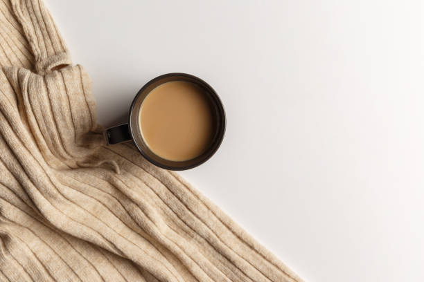 istock Abstract autumn composition. Colorful background image. Autumn, winter concept. Top view. Flat lay. Copy space. Plaid, cup of coffee on white background. Thanksgiving day concept 1288254712