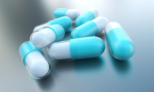 Blue capsules. Medicine concept