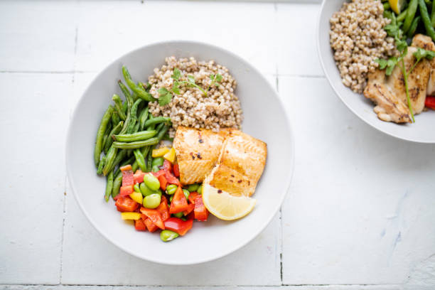 istock Salmon and buckwheat dish with green beans and tomato 1288256992