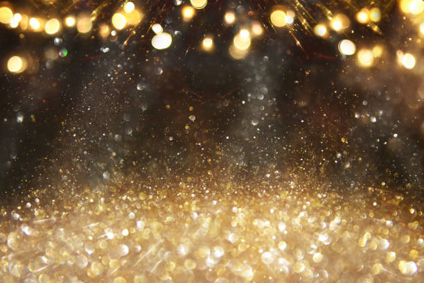 istock background of abstract glitter lights. silver, gold and black. de focused 1288257501
