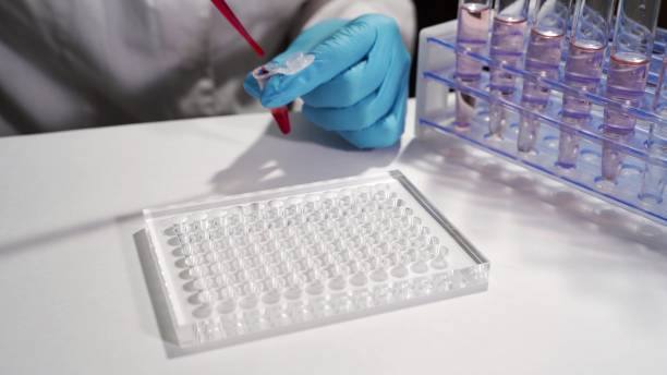 istock Immunological blood test. A laboratory assistant in a modern place makes a blood test 1288258947