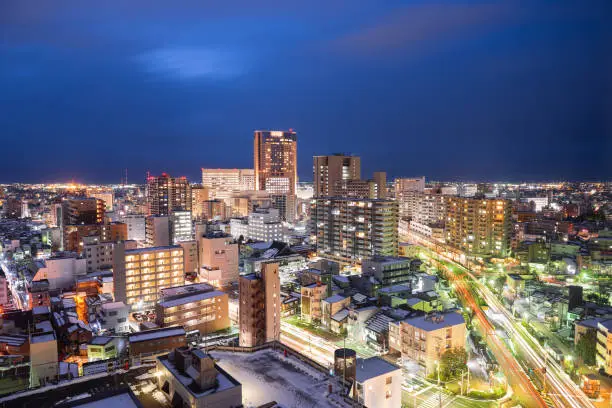 Kanazawa, Ishikawa, Japan downtown city skyline in winter at twilight.