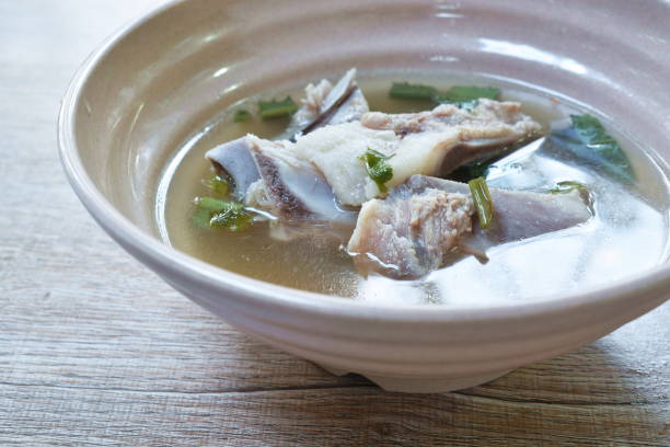 istock boiled pork bone in clear soup 1288270317