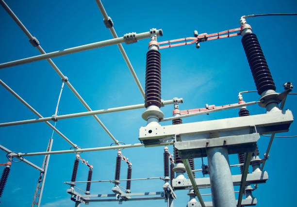 Circuit breaker and power lines in electricity substation. Power plant