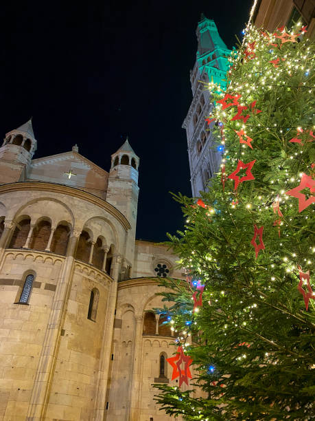 istock christmas tree decorations in Modena, Italy. Lights, christmas balls and decorations 1288271122