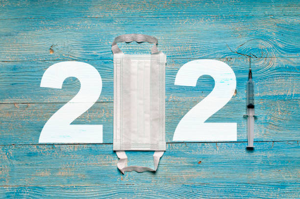 istock 2021 designed from the mask and syringe 1288271222