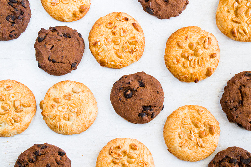 Cookies on the white background, sweet pastry dessert with chocolate and nuts