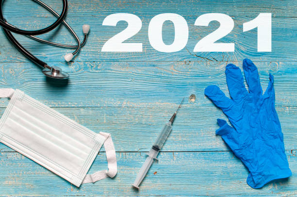 istock 2021 designed from the mask, stethoscope, glove and syringe 1288273763