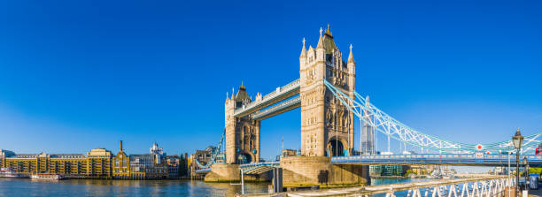 istock London Tower Bridge spanning River Thames blue sky morning panorama 1288276345