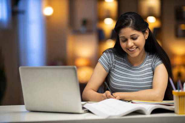 istock woman studying at home 1288280070