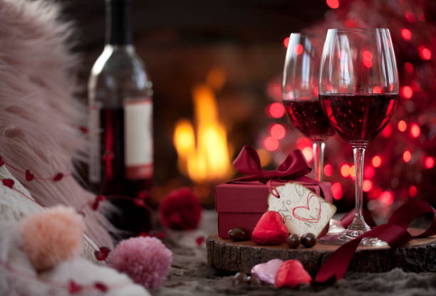 istock Valentine's Red Wine in Front of a Fireplace 1288281381