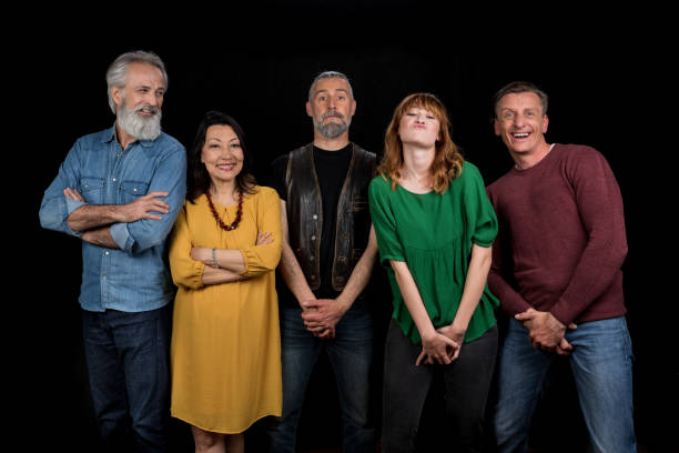 istock Group of people showing various poses and grimaces 1288282673