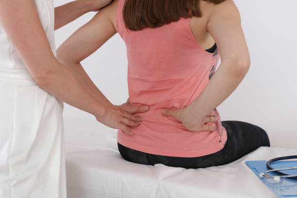 istock Pregnancy Low back pain relief concept. Chiropractic, Osteopathy, Physiotherapy. 1288283425