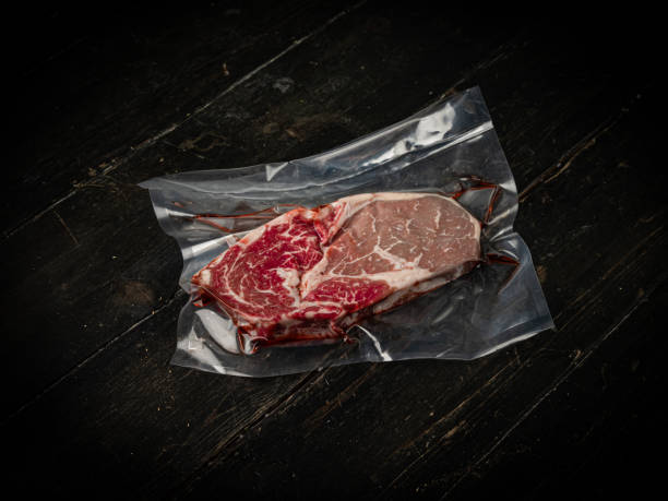 istock Vacuum-packed raw new york beef steak. 1288287134