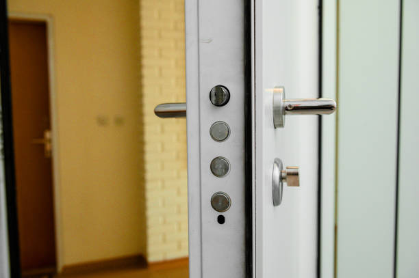Shallow focus of an interior door handle seen on a fire door