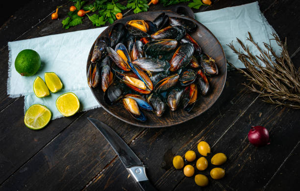 istock Blue mussels with ingredients for cooking 1288289794