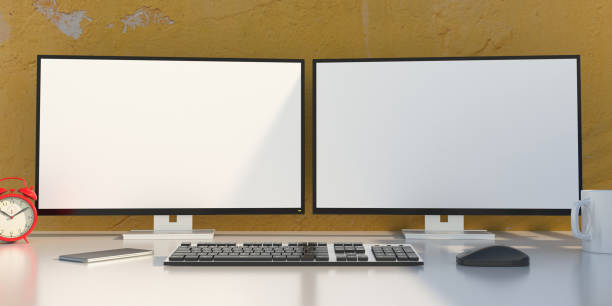 blank screens on a computer desktop monitors, yellow color wall background. 3d illustration - dois objetos imagens e fotografias de stock