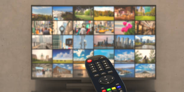 istock Photos collage on TV screen and television remote control. 3d illustration 1288292218