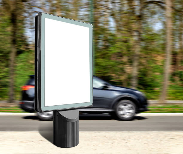 istock Vertical Urban signboard against car in movement in Forest road 1288294840