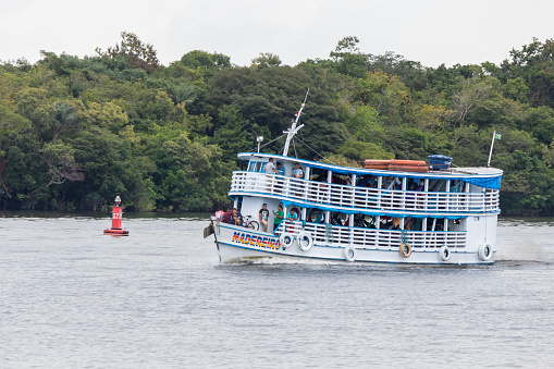 Oriximina/Para/Brazil - Sep 16, 2019: Brazilian traditional boat sailing on Trombetas river.