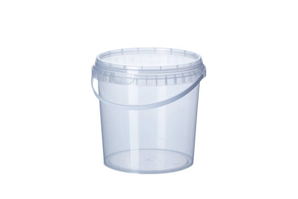 istock Transparent plastic bucket with transparent lid - 1000 ml, plastic containers on white background- , food plastic box isolated on white, product packaging for foodstuff or paints, adhesives, primers 1288297027