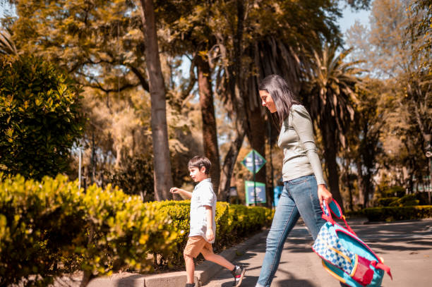 istock Mother and son going to the park 1288297101