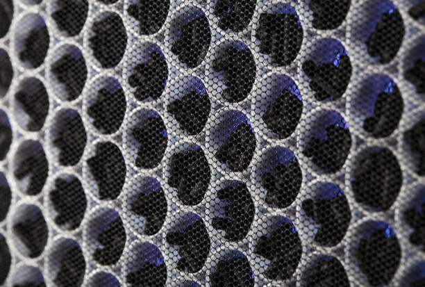 Multi-stage air filter with UV radiation and activated carbon granules. Air purification and disinfection system. HEPA filter for health, protection from Allergies, dust, viruses and bacteria Multi-stage air filter with UV radiation and activated carbon granules. Air purification and disinfection system. HEPA filter for health, protection from Allergies, dust, viruses and bacteria. multiengine stock pictures, royalty-free photos & images